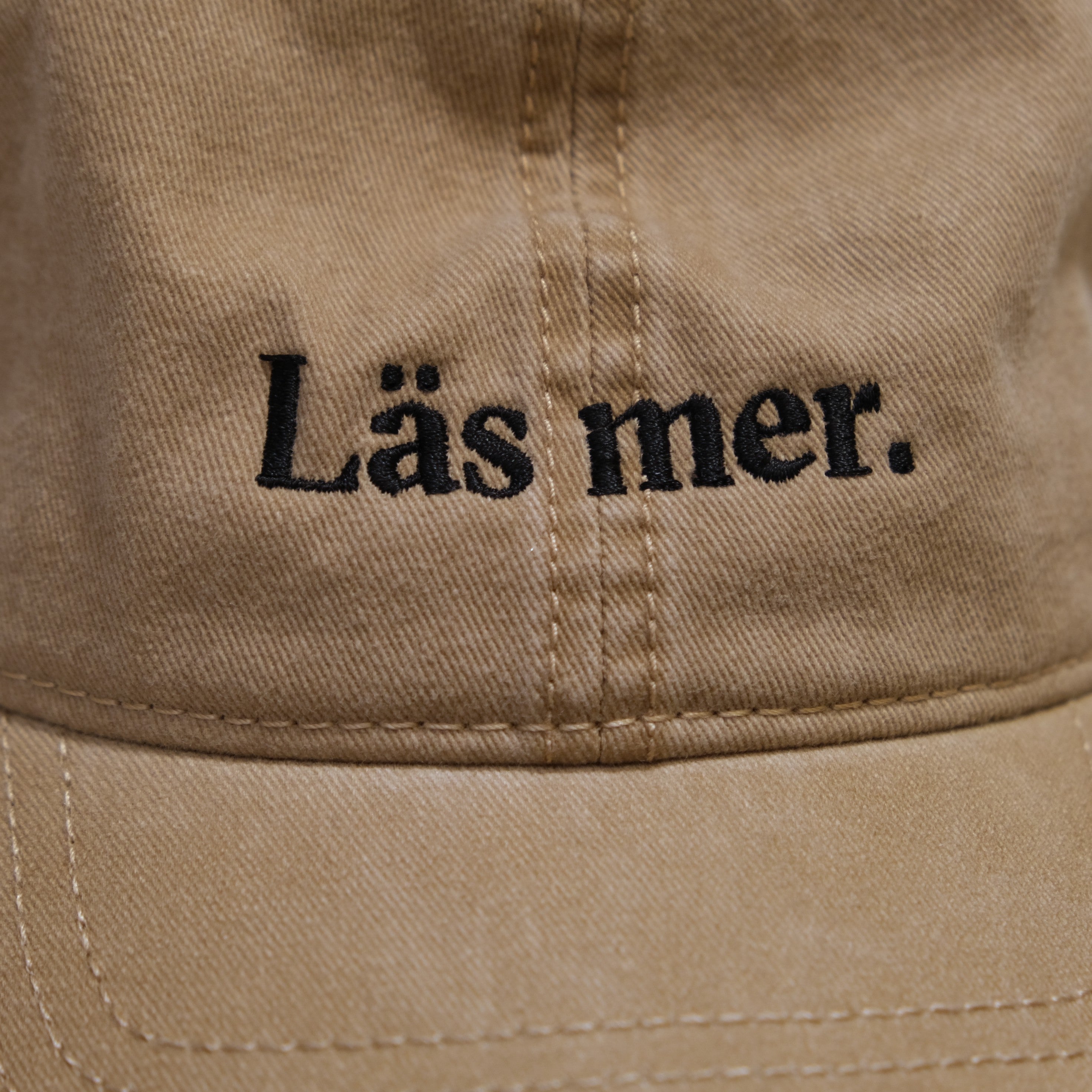 Beige keps: Läs mer