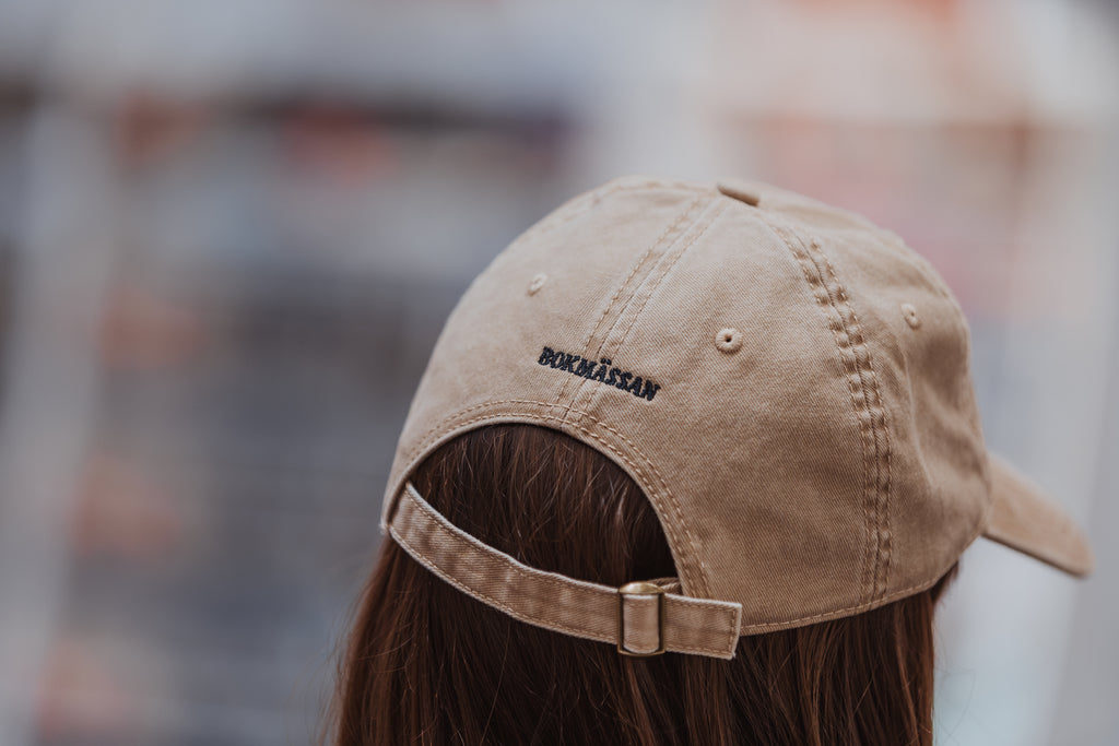 Beige keps: Läs mer